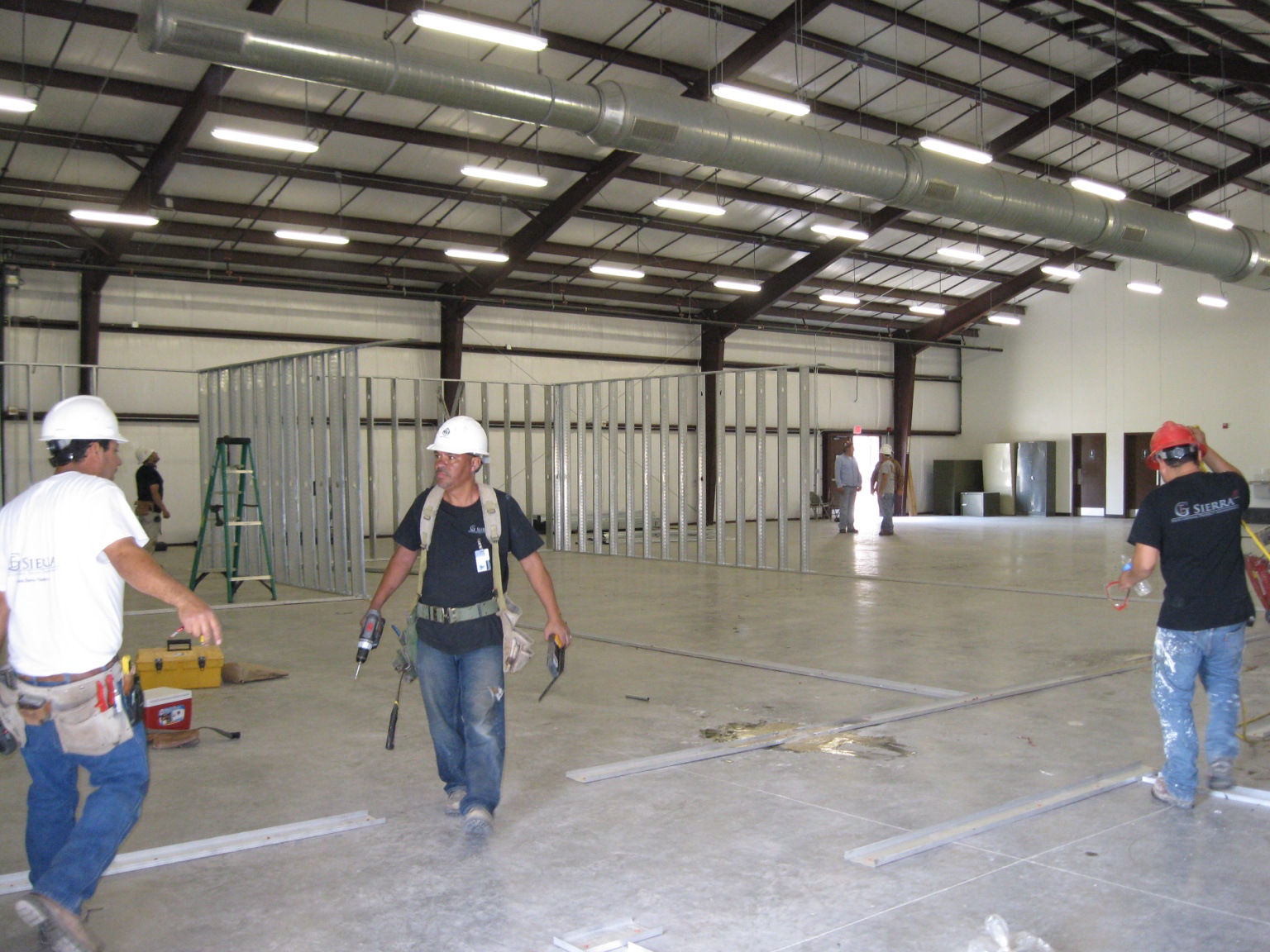 EG Sierra crew members wearing company shirts on a federal construction project